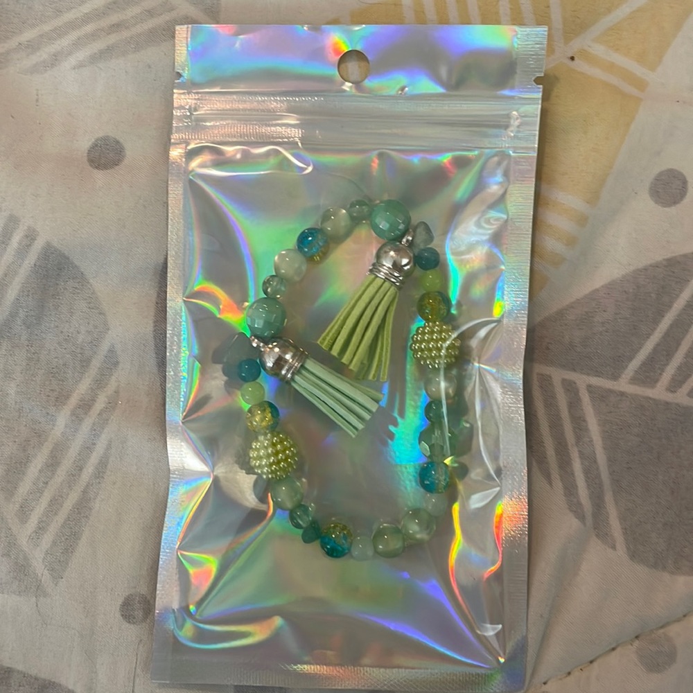 Homemade charm and beaded bracelet